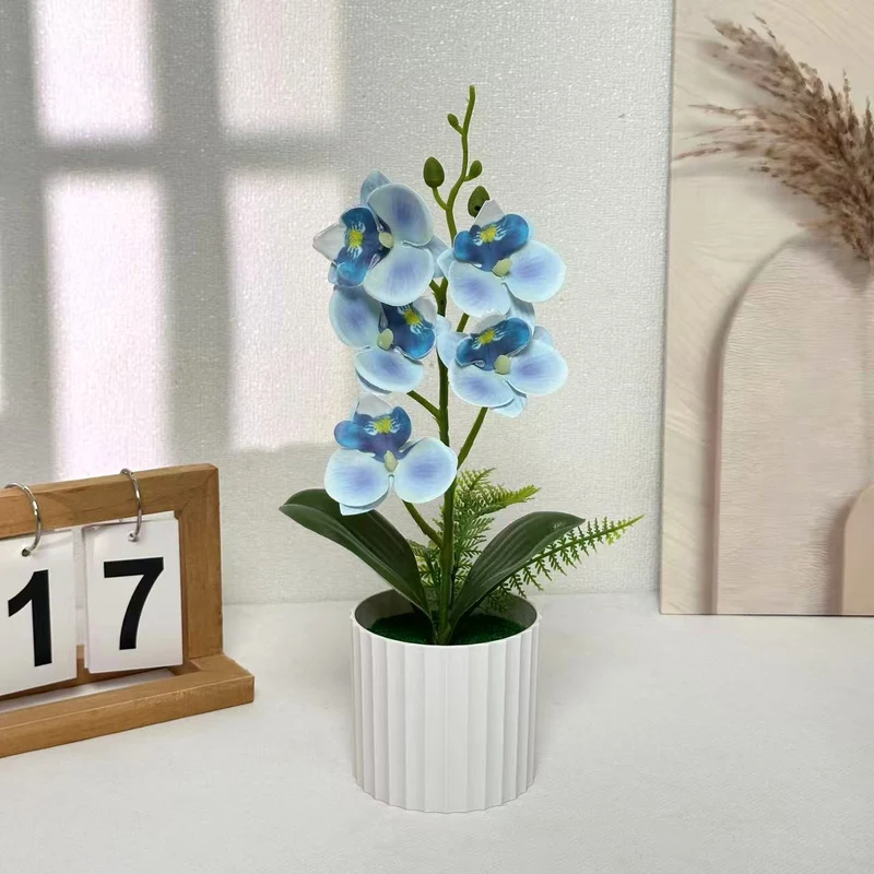 Faux Orchideen Arrangement für Innendekoration zuhause