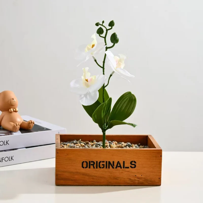 Elegante künstliche Orchideenarrangement für Tischdekoration