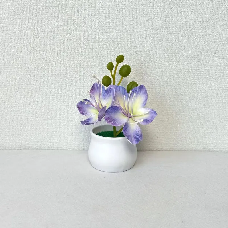 Elegantes Miniatur-Blumengesteck