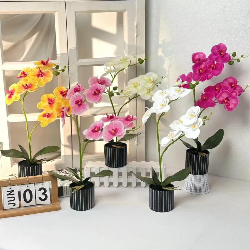 Künstliche Orchideenarrangement für die Innendekoration Zuhause