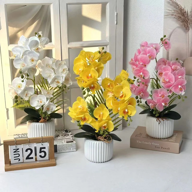 Künstliche Orchideenarrangement für dekorative Wohnbebilderung
