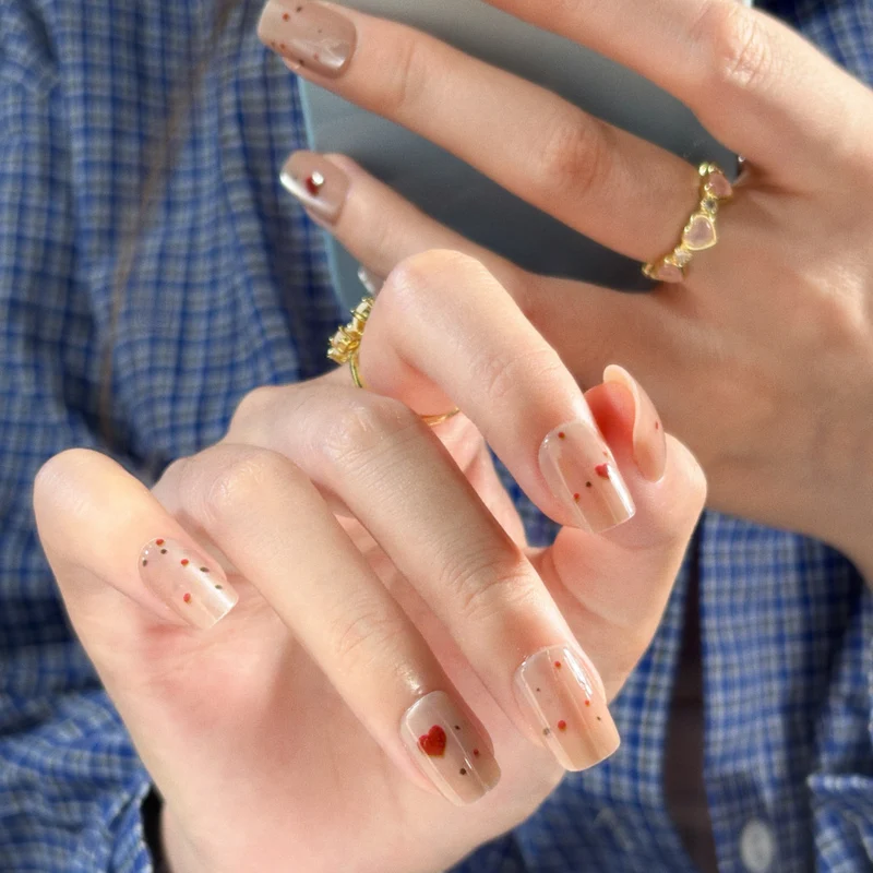 Künstlerisch floral gestaltete Stiletto Press-On Nägel